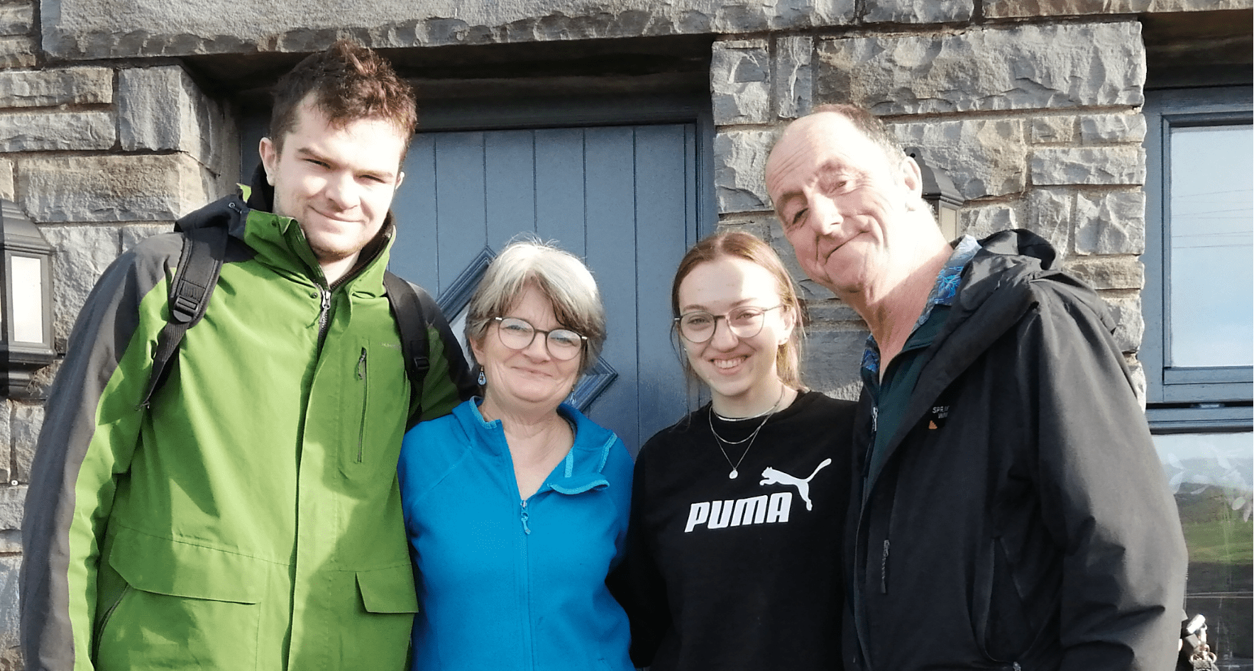 Anne McCluskey with her husband and two children